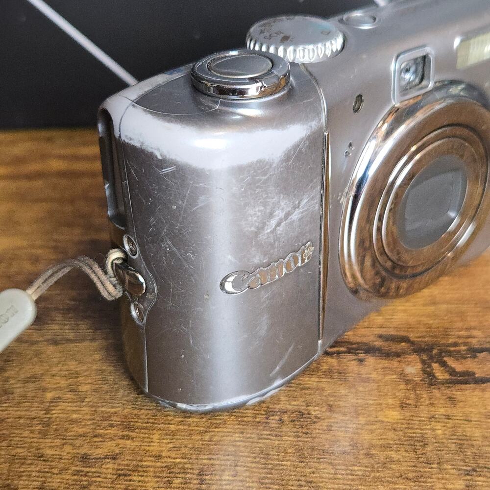 Canon PowerShot A1100 IS 12.1MP CCD Digital Camera Silver Tested Working